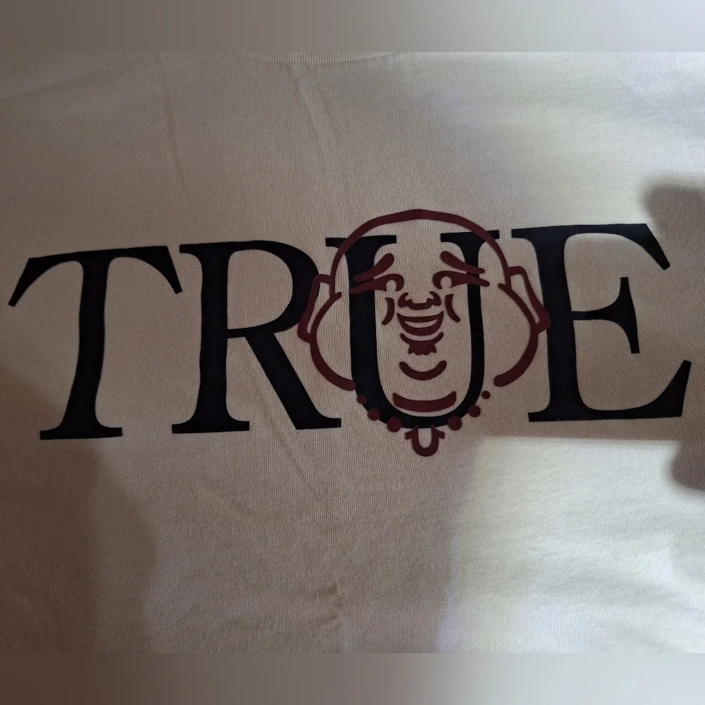 A True Religion T-shirt men's 3XL. Featuring the word True with Buddha